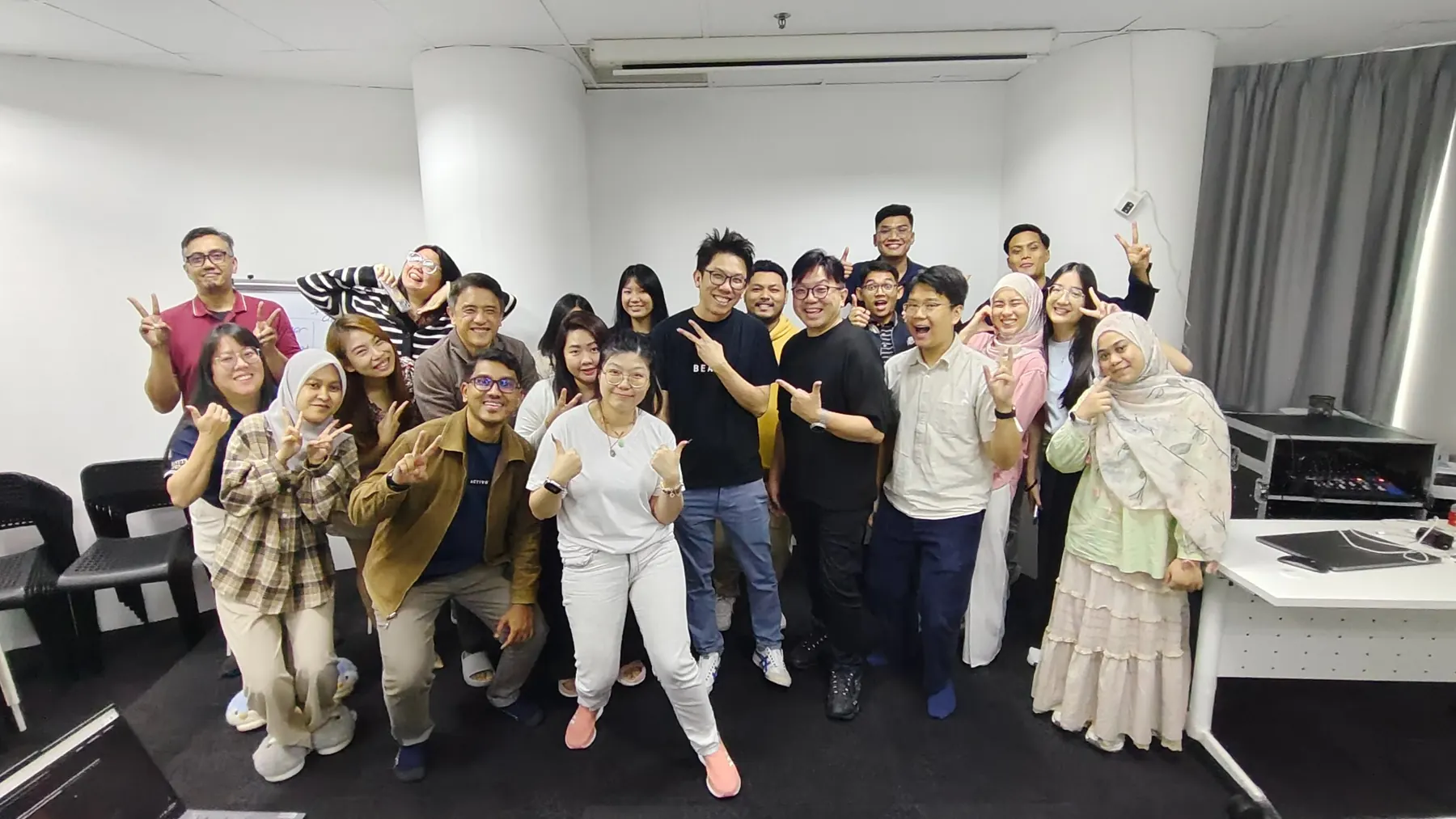 Participants following a live creative AI demonstration