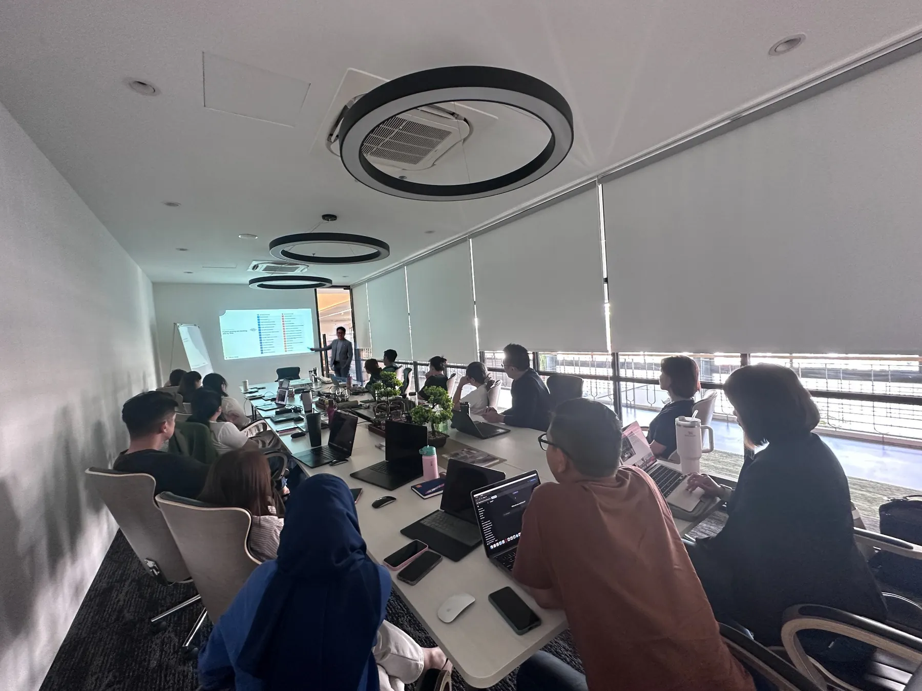 Participants applying AI workflows during a hands-on training session